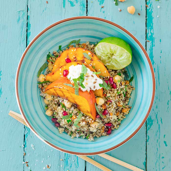 Buddha bowl with quinoa and chickpea salad, grilled pumpkin and cottage cheese