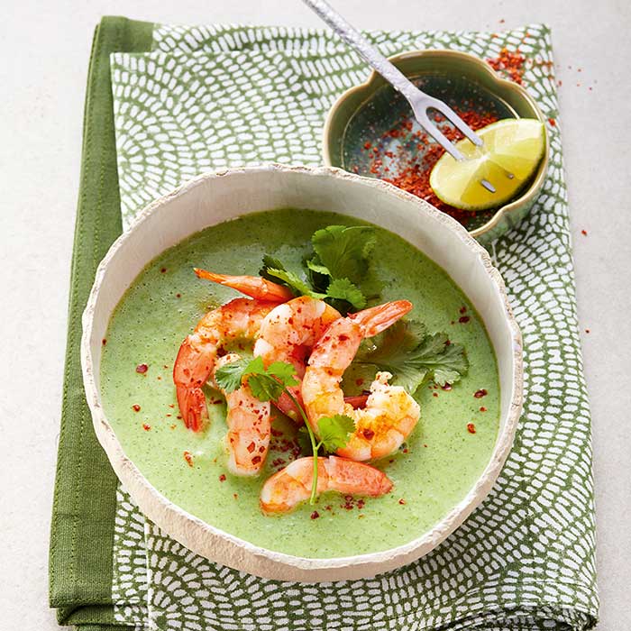 Broccoli and coconut soup with shrimps